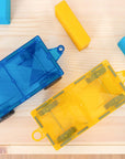 Rainbow Car Pack 2 pc featuring blue and yellow magnetic motion bases with rubber wheels on a wooden surface.