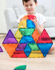 Child playing with colorful Connetix tiles from the Rainbow Shape Expansion Pack 36 pc, building unique structures.