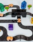 Creative Roads Pack 48 pc showcasing a colorful winding road layout with cars, trees, and geometric shapes.