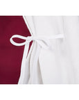Close-up of white ribbon tie on the Tent 'Tipi Jakara', showcasing quality craftsmanship for children's play tent.