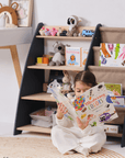 Goodevas 2-in-1 Bookshelf & Toy Storage Unit with a child reading a colorful book in a cozy play space.