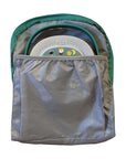 Timio Backpack showing organized storage for Timio player and discs in elastic mesh pockets.