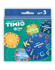 Timio Disc Pack Set 3 featuring colorful discs for learning vegetables, time, fairy tales, and the alphabet.