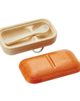 Feeding Set includes a wooden food container and spoon for nurturing play and care for dolls and soft toys.