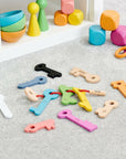 Rainbow Wooden Keys set with multicolored wooden pieces for playful learning and hands-on play.