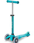 Mini Micro Deluxe scooter in turquoise color with smooth PU wheels and adjustable handlebar.