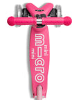Mini Micro Deluxe scooter in vibrant pink, designed for small riders with a lightweight frame and smooth wheels.