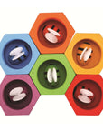 Colorful Beehives set featuring bees matching their hives for fine motor skill development.