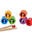 Colorful Beehives set with wooden tweezers and playful bees for children's fine motor skill development.