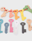 Rainbow Wooden Keys set featuring colorful wooden keys for hands-on play and learning.
