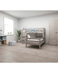 Modern grey bunk bed in a bright child's room, featuring a sturdy ladder and safety rails, perfect for small spaces.