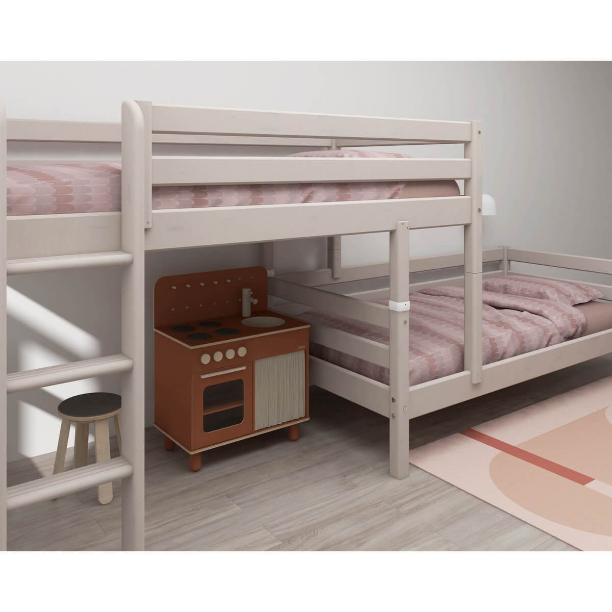 FLEXA Classic semi-high bunk bed in grey with ladder and safety rail, featuring cozy bedding and play kitchen.