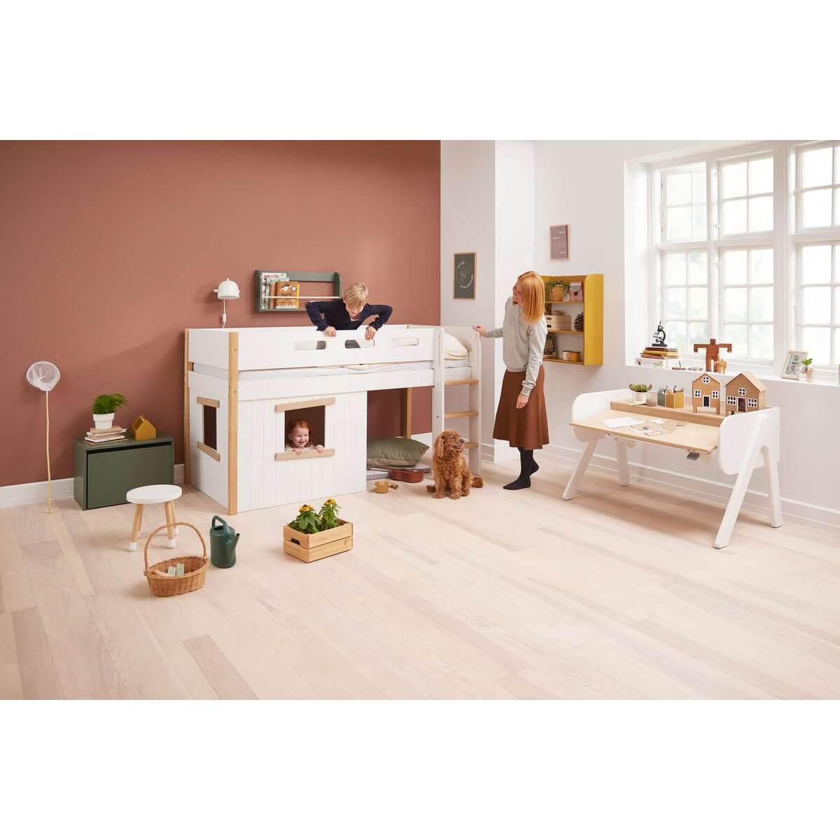 High bed with treehouse design, children playing, and a cozy room for imaginative play, featuring white and oak finishes.