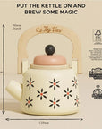 Le Toy Van Vintage Wooden Kettle with floral design for tiny tea parties and pretend kitchens.