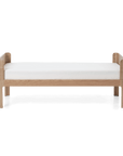 Junior bed in oak, 150x70 cm with soft rounded edges and minimalist design, perfect for a child's calming sleep space.